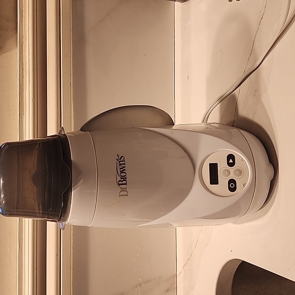 Dr. Brown' s bottle warmer.